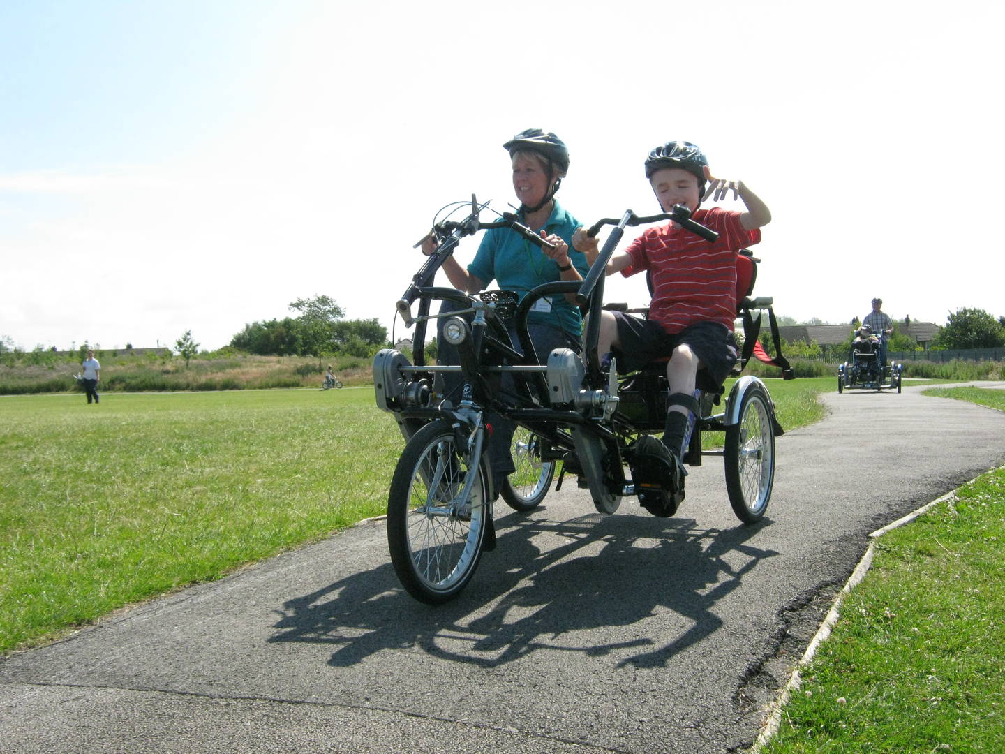 Two people on a bike