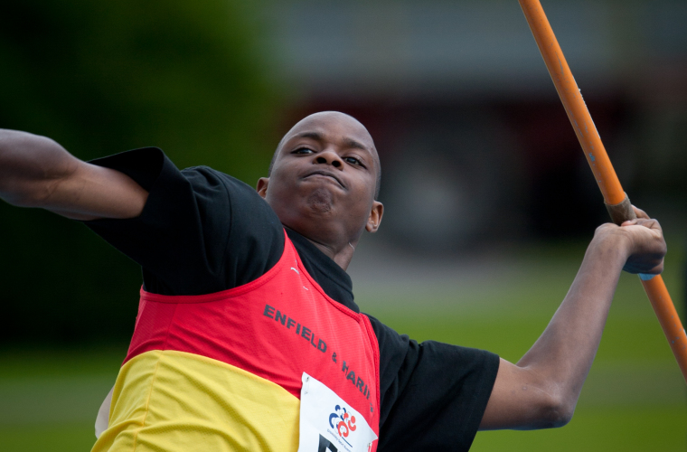 Junior athlete throwing a javelin