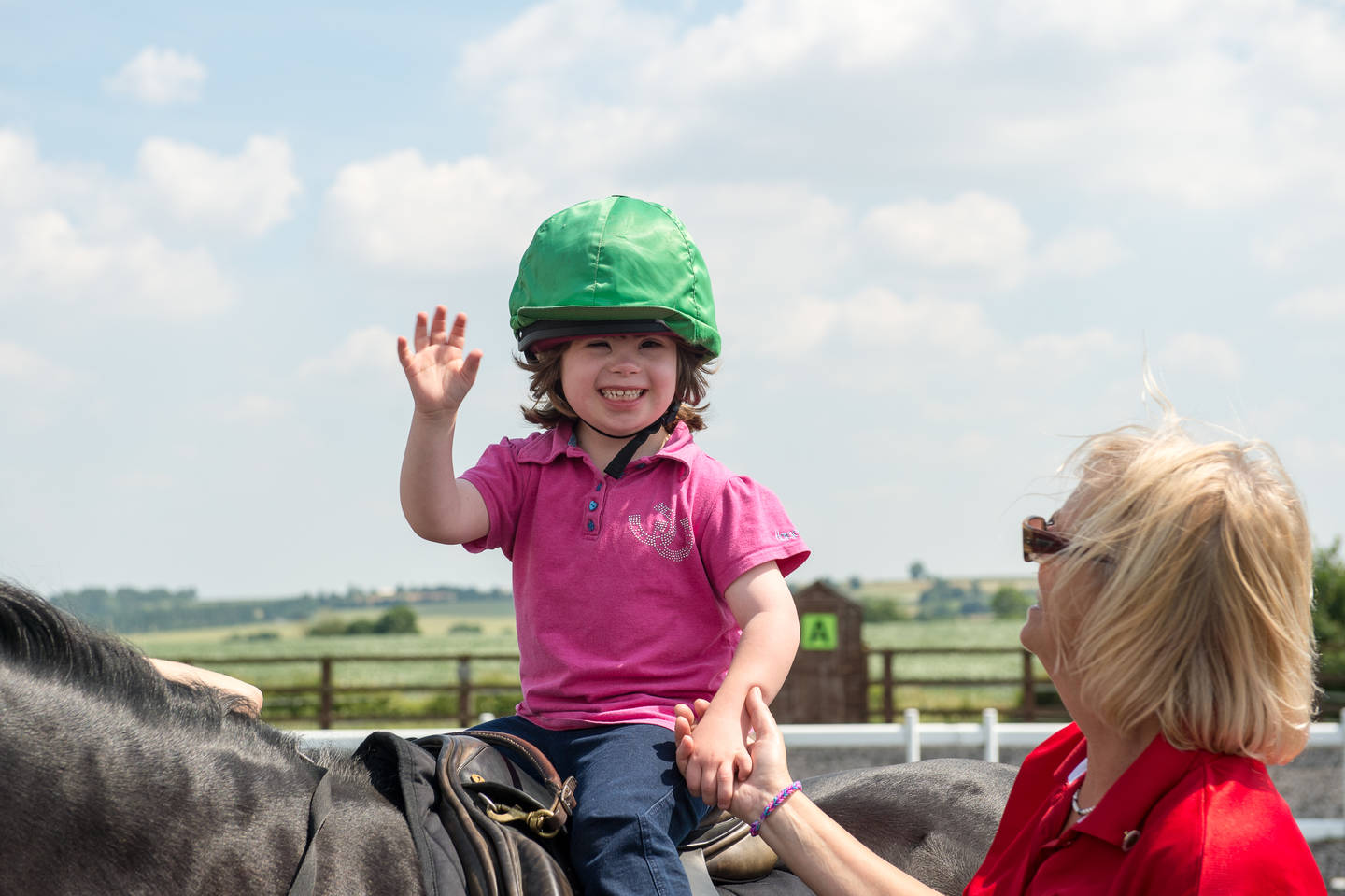 Girl enjoying riding a horse. Credit RDA.