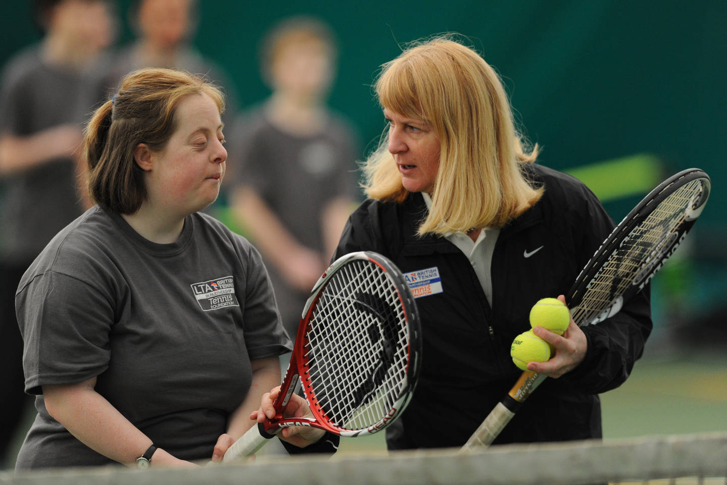 Players with visual impairments playing tennis
