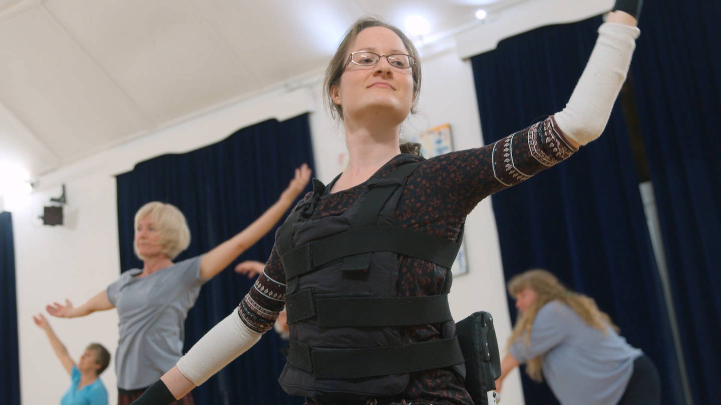 Hannah being active in a dance class