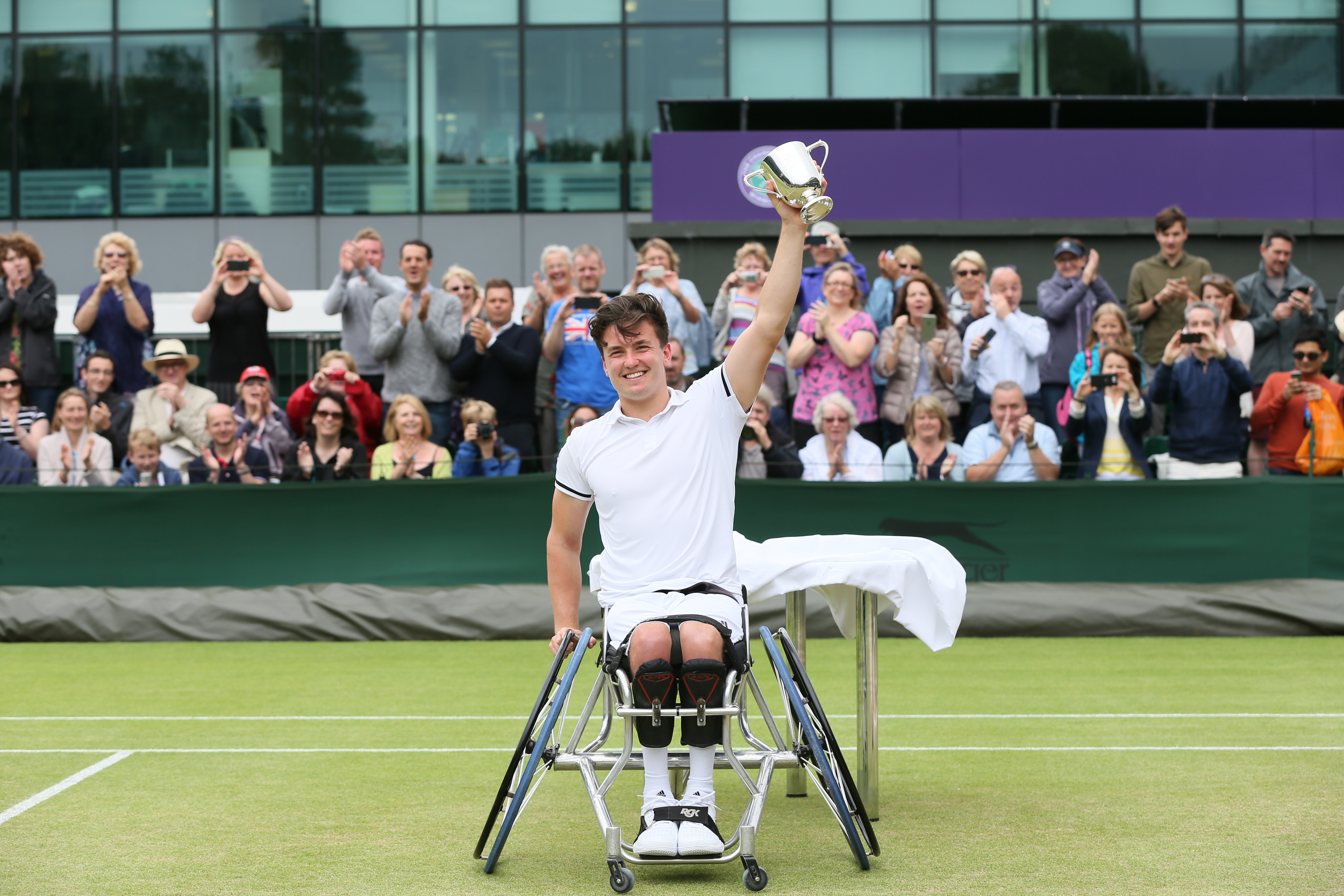 Reid wins historic Wimbledon wheelchair tennis singles