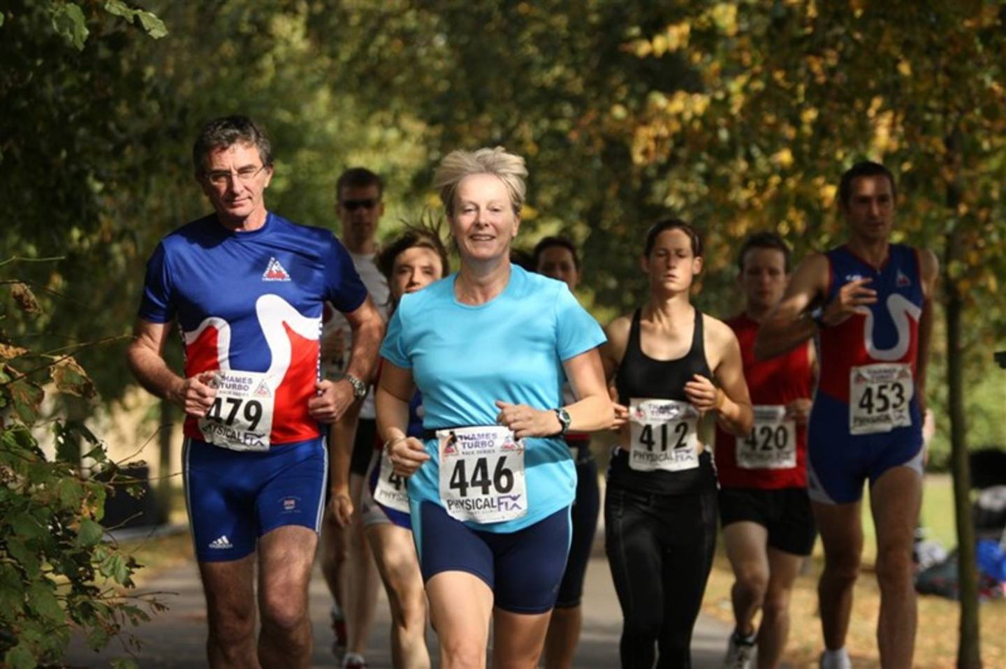 Group in a park running