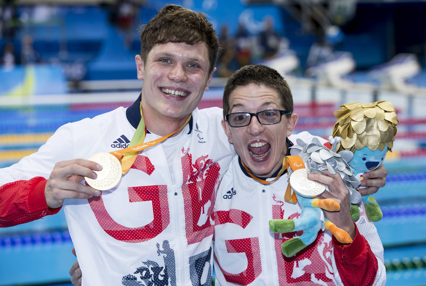 Swimmer Aaron Moores wins gold in 100m Breaststroke SB14 with Scott Quin who won silver