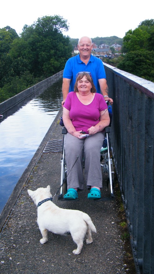 Jackie out geocaching with her husband