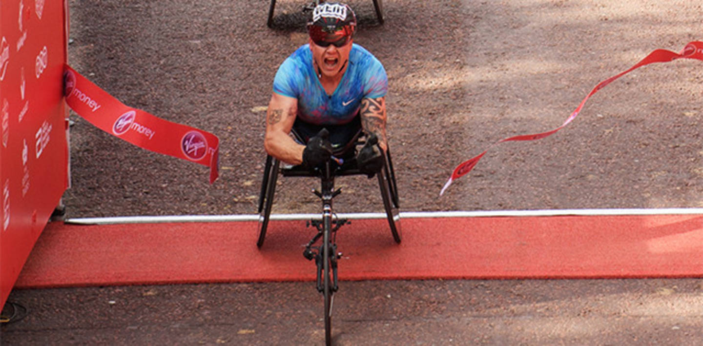 David Weir goes through the finishing tape