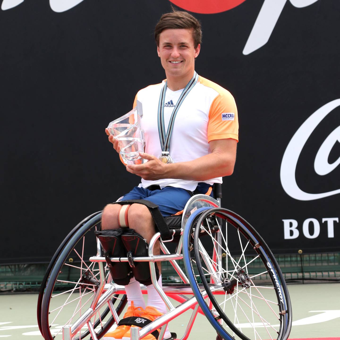 Gordon Reid holds trophy after winning Japan Open