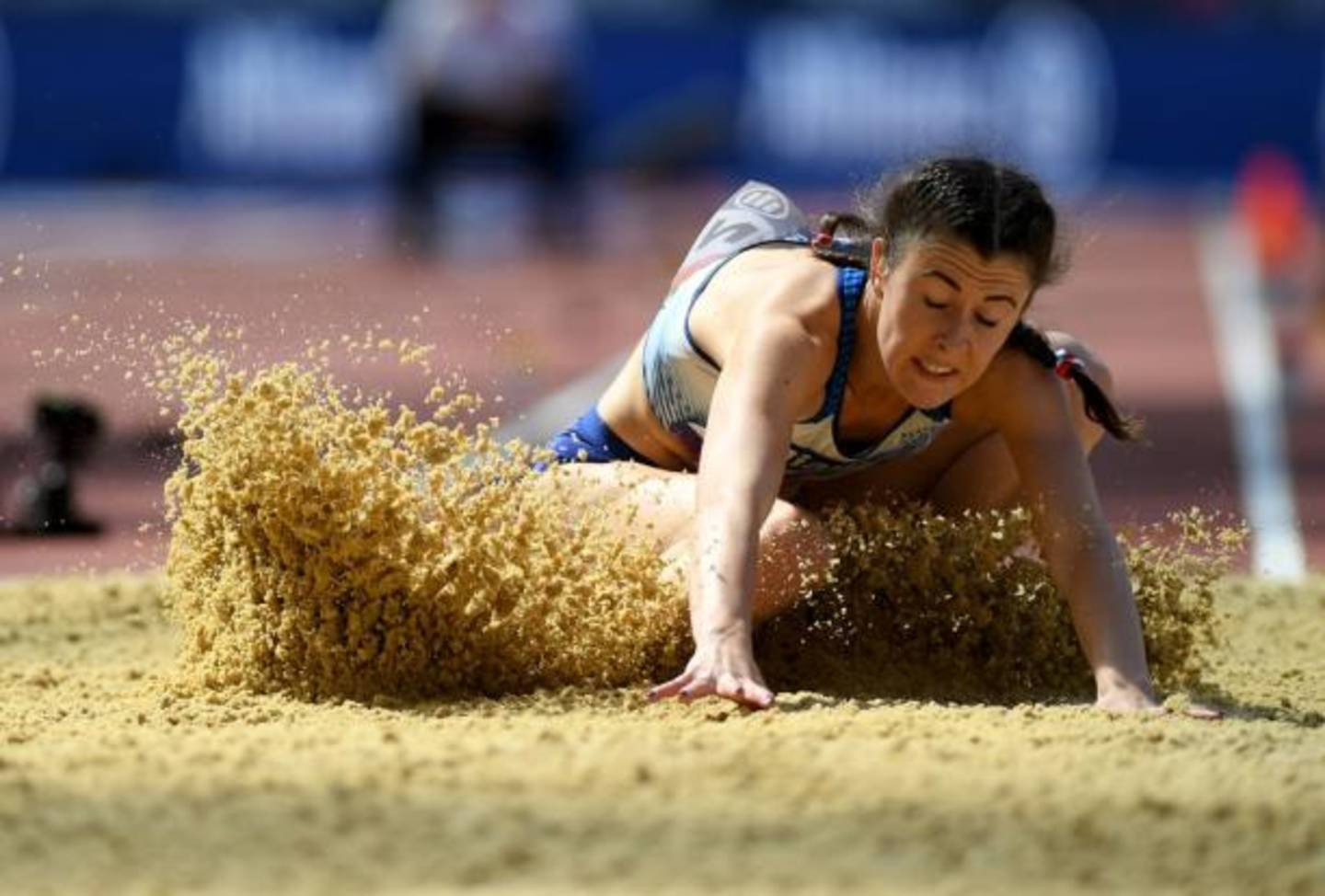 Olivia Breen doing the long jump at the World Para Athletics Championships 2017