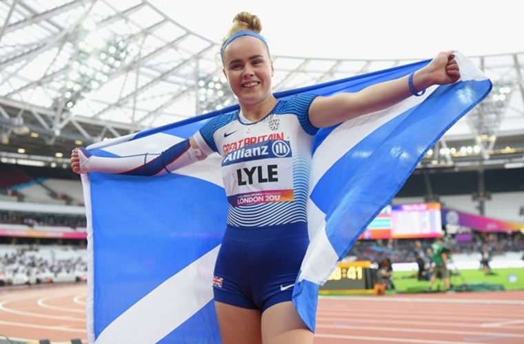 Sprinter Maria Lyle celebrating after winning bronze medal in sprint race