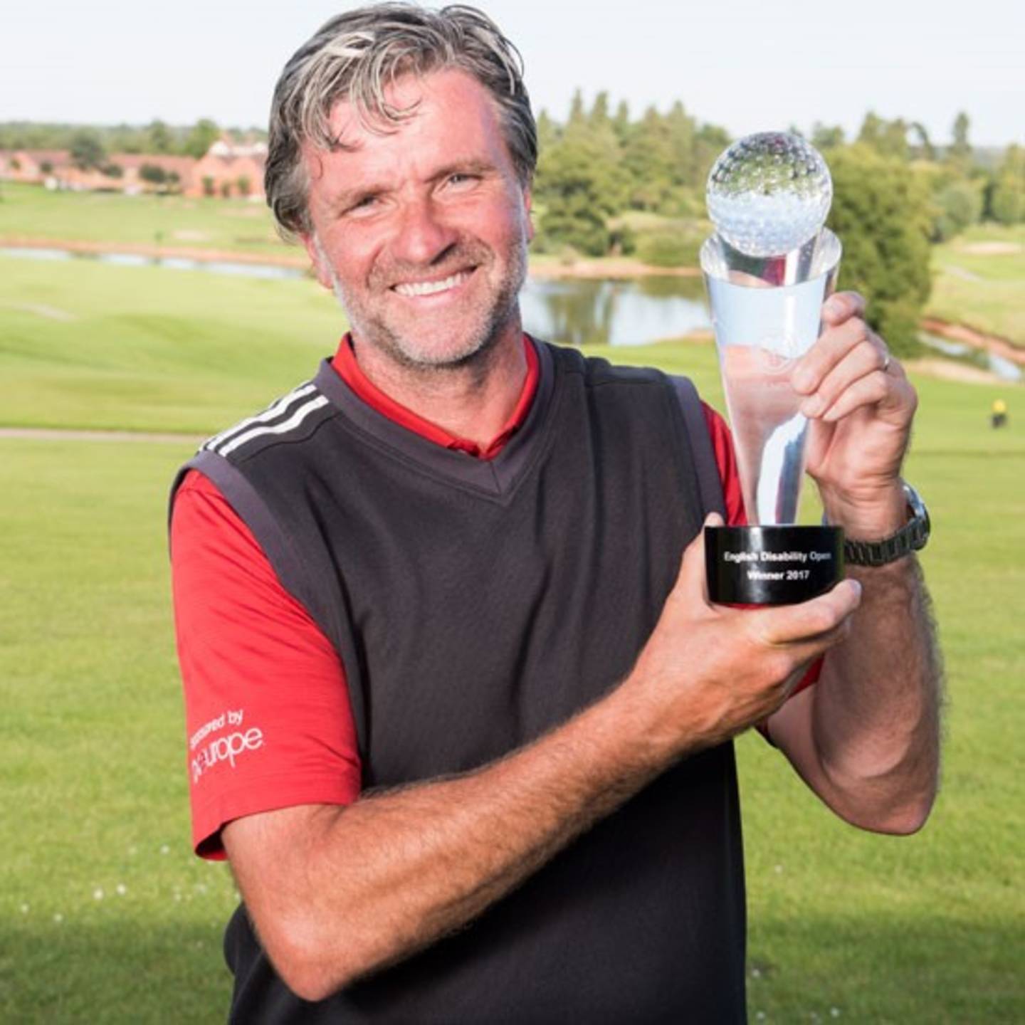 Kevin Harmison holding the English Disability Open 2017 trophy