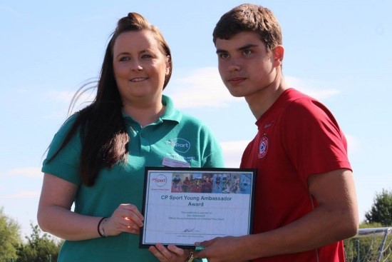 Ben Meadows being handed his CP Sport Young Ambassador Award