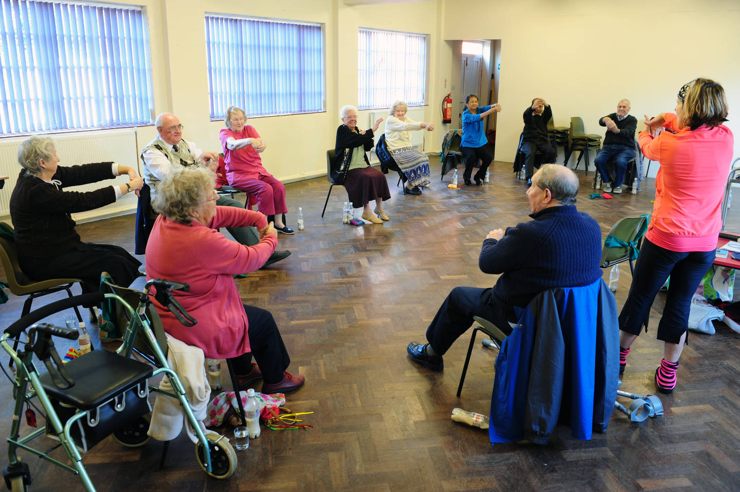 Older people taking part in an exercise class