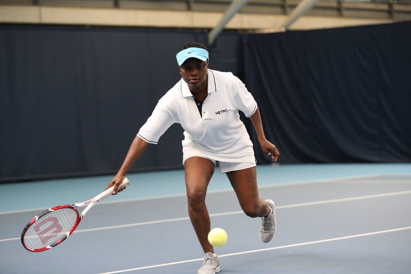 Brenda Cassell playing tennis