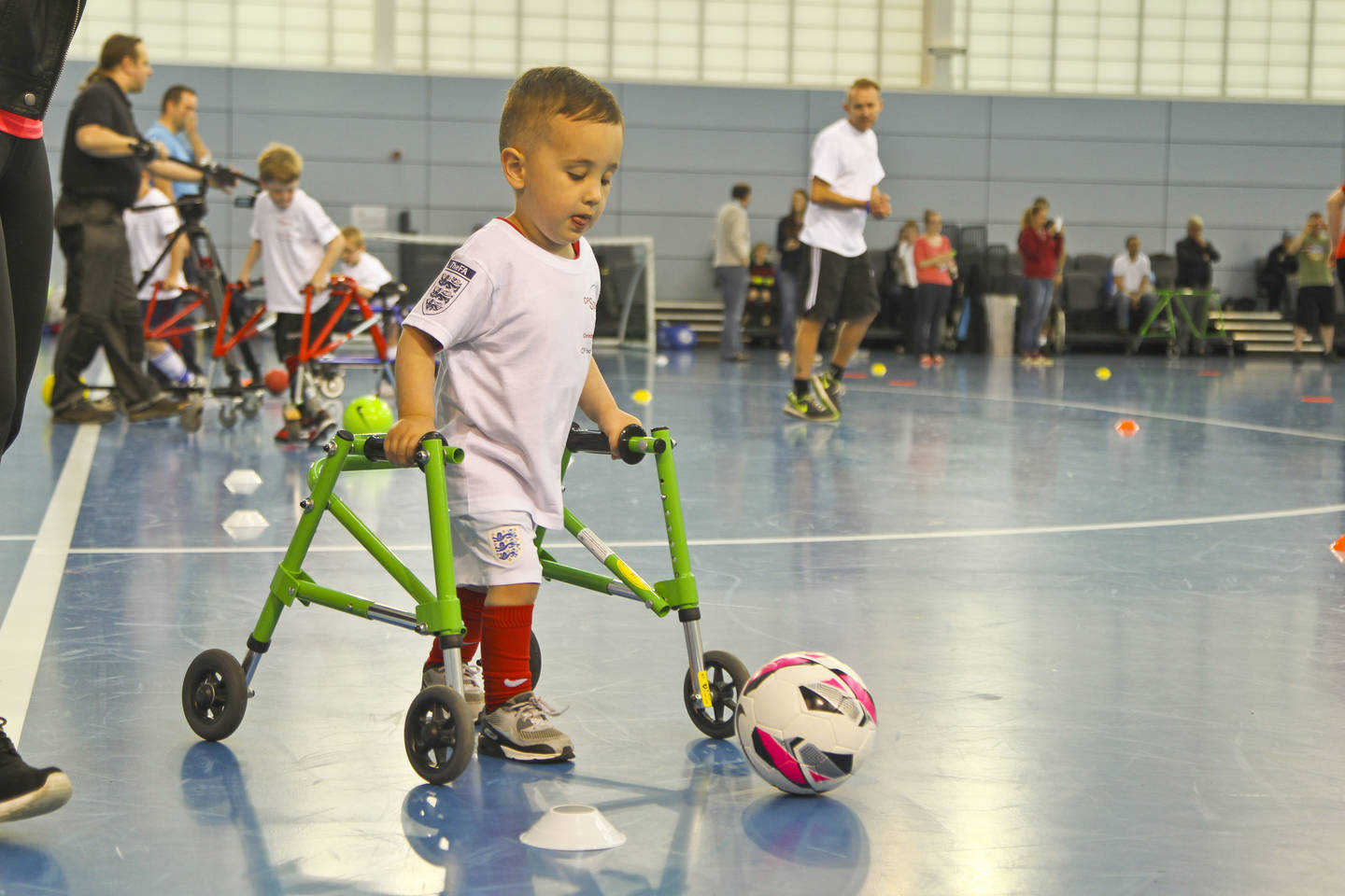 Young boy playing frame football 