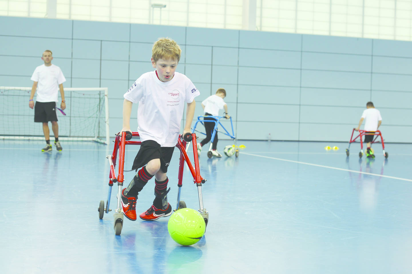 Young boy playing frame football