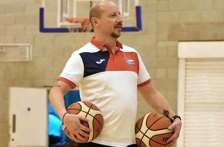 Andy Craddock with Basketball in hand. 