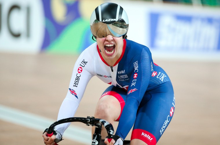 Katie Toft cycling in velodrome at Para-cycling Track World Championships