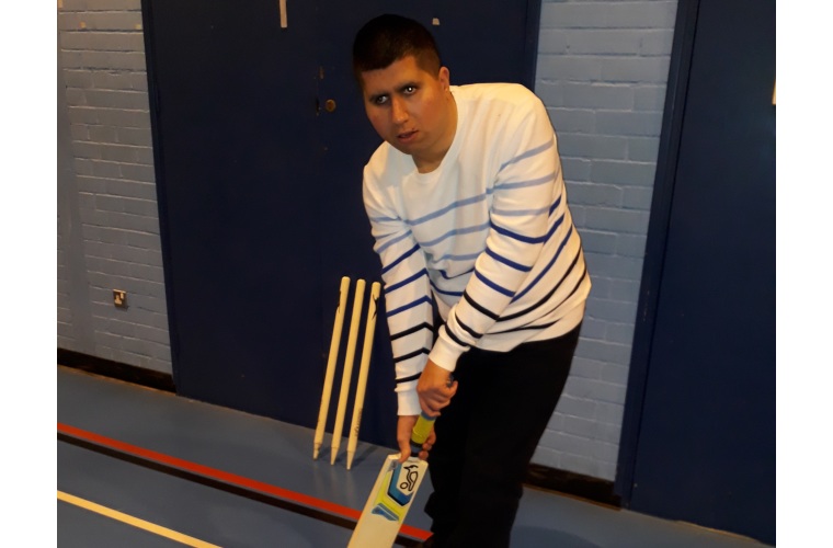 Owais giving a cricket demonstration 