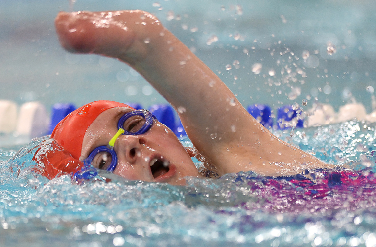 Competitor swimming freestlye in the National Junior Para Swimming Championships 2018