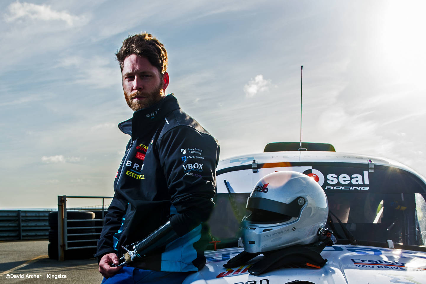 Jon-Allan Butterworth standing in front of Team BRIT racing car