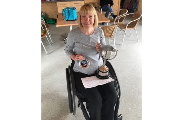 Julia holding Judi Figgures Cup after winning at English Nationals sailing competition 