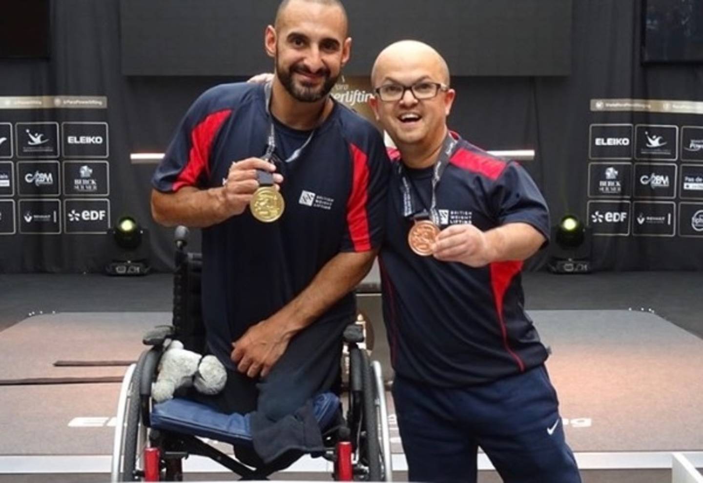 Ali Jawad and Adam Alderman with medals in hand at the Para Powerlifting Championships.