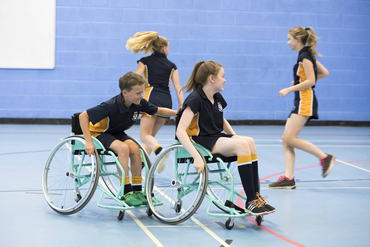 School pupils enjoying PE lesson.