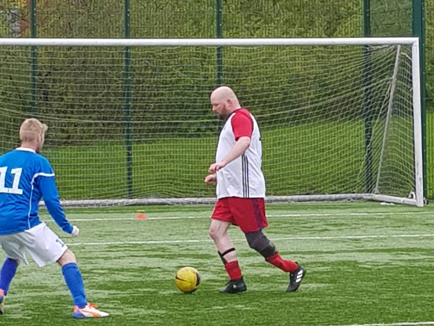 Marc playing football 