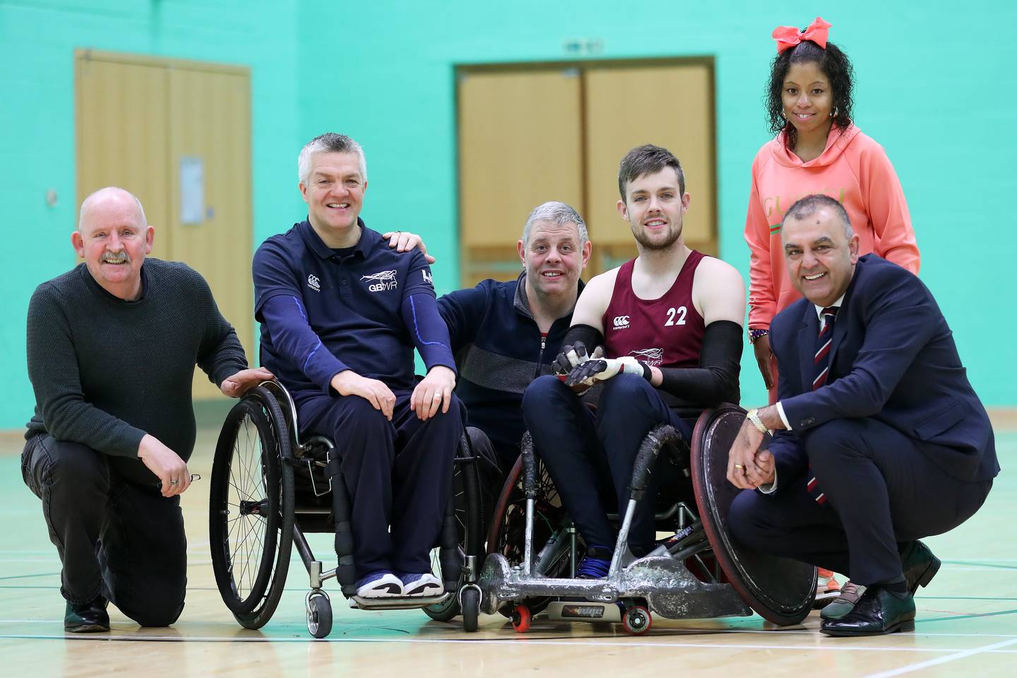 Cllr Bill Gavan, Head Coach Paul Shaw, GBWR team captain Chris Ryan and SLT CEO Ash Rai and Portway service users Conrad Horton centre rear and Jodie Brown rear right.