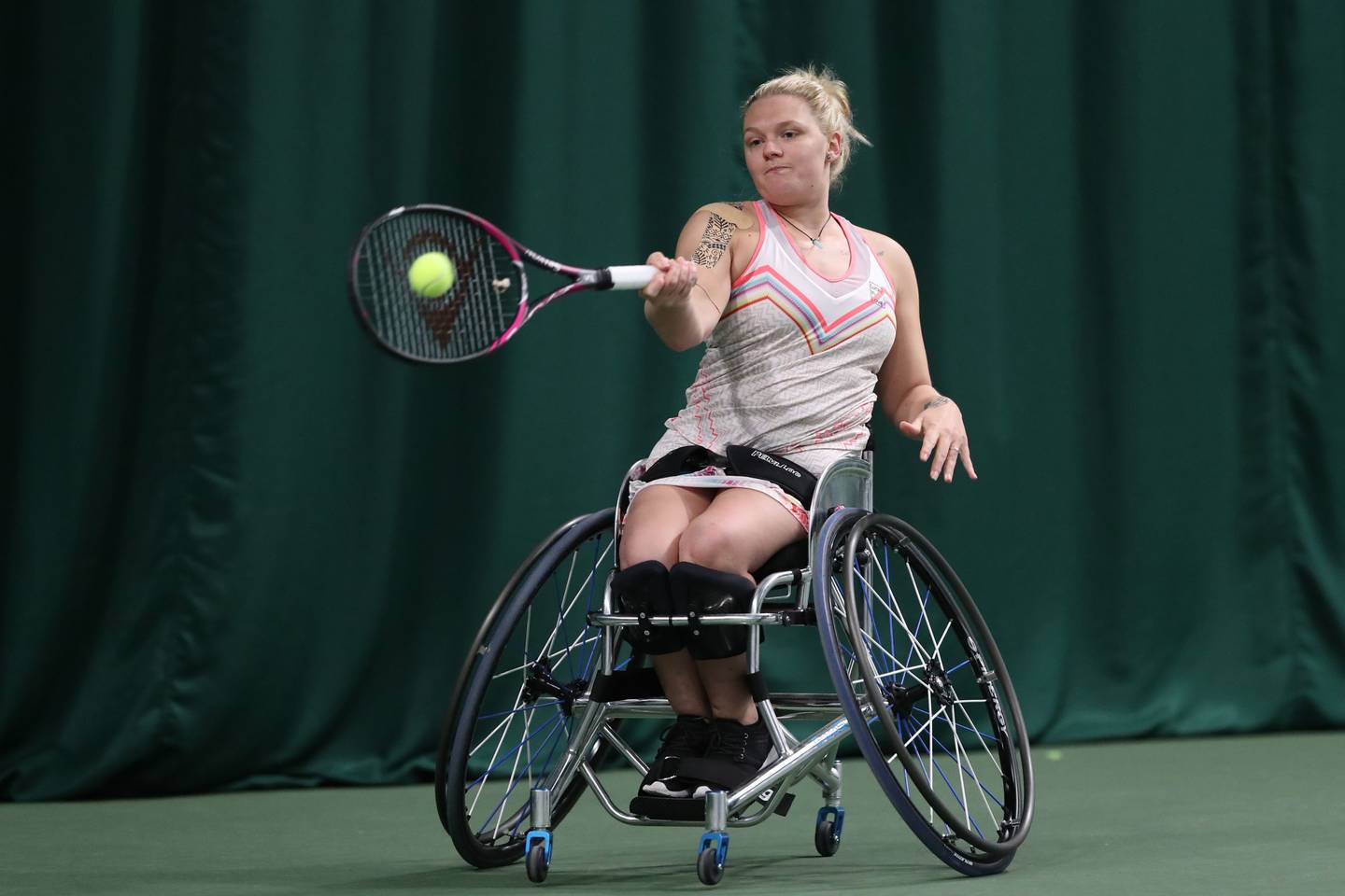 Jordanne Whiley on court playing forehand shot