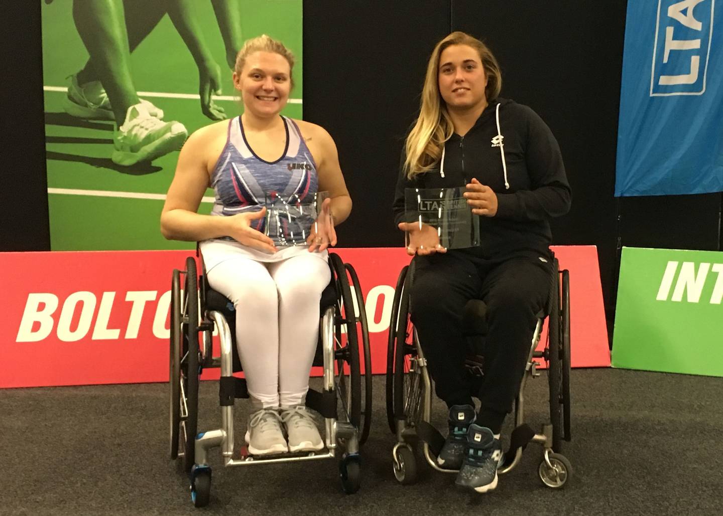Jordanne Whiley and Giulia Capocci with Bolton Indoor trophies