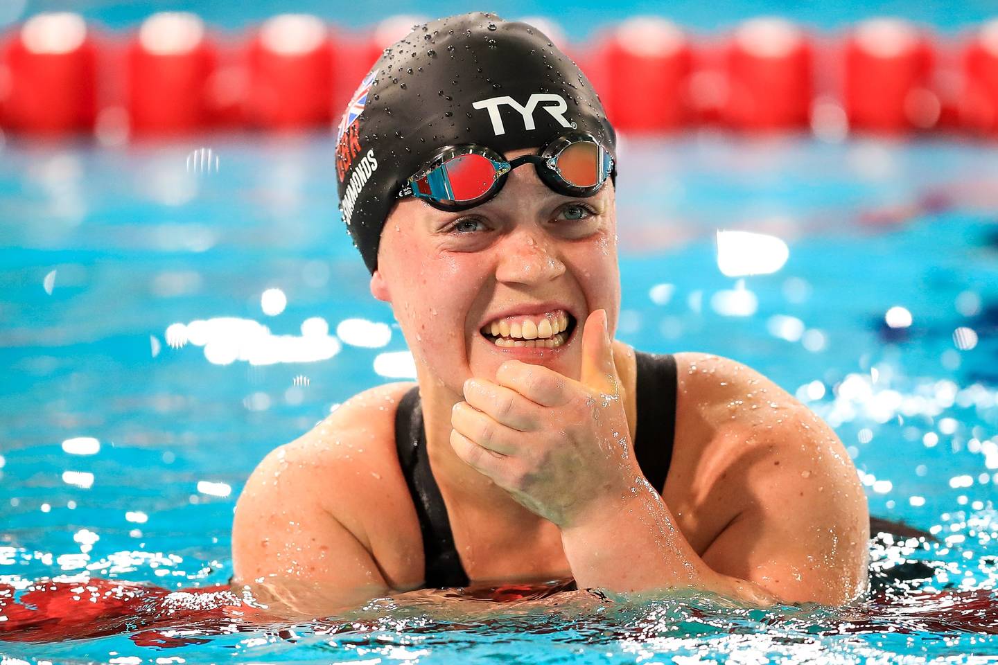 Ellie Simmonds smiling in the Glasgow pool
