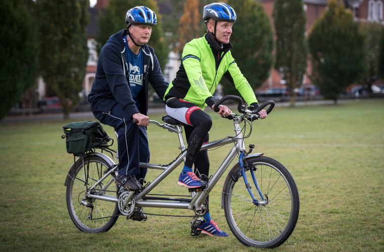 Visually impaired rider and sighted rider on tandem bike. Credit British Blind Sport