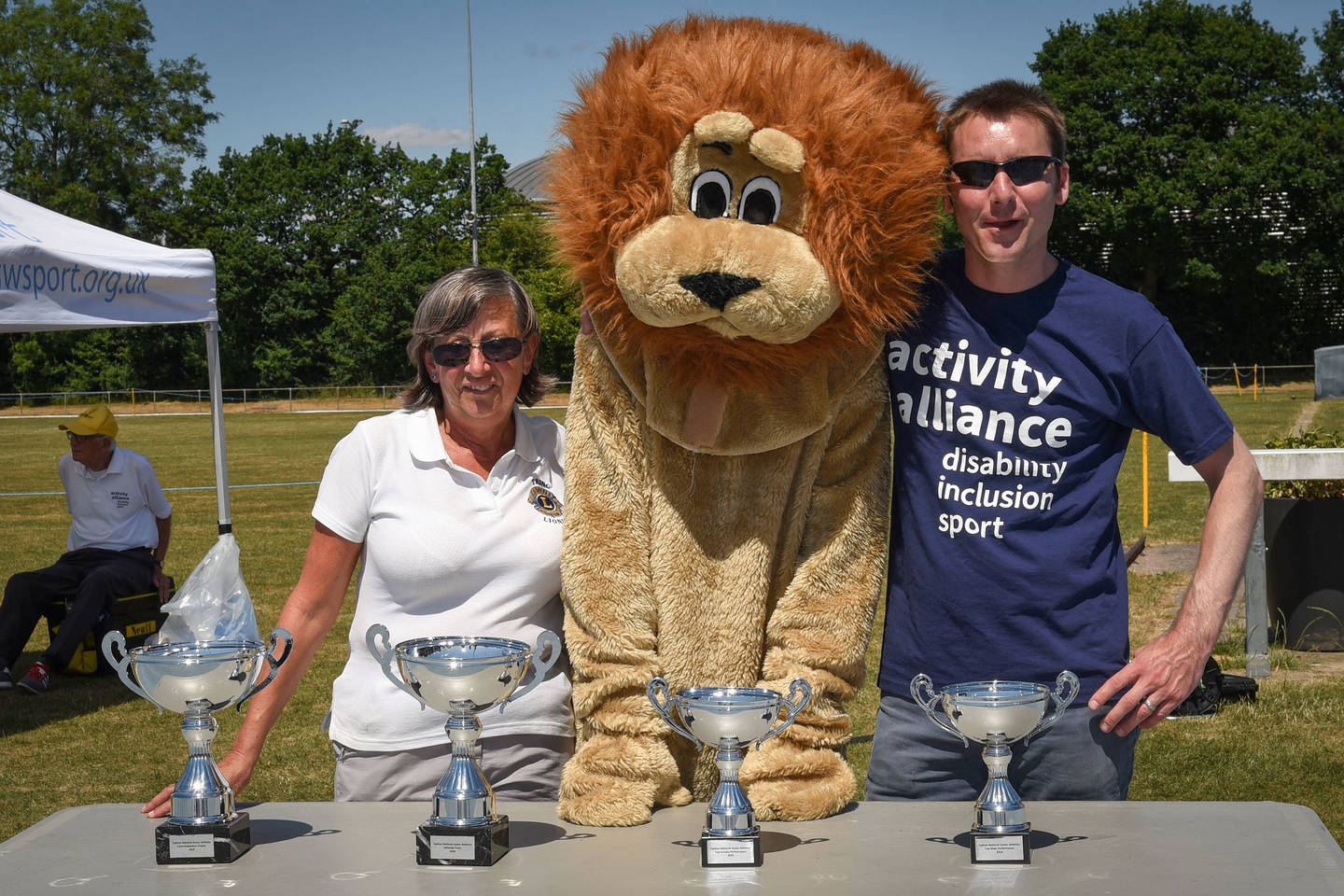 Penny, Lions mascot, and Activity Alliance Deputy Chief Executive Andy Dalby-Waslh at the 2018 Championships. 