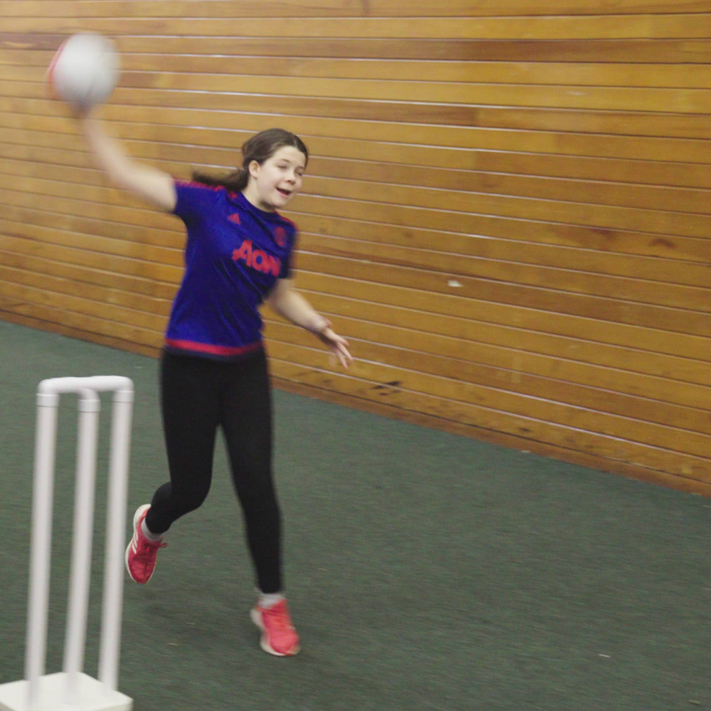 Freya bowling cricket ball