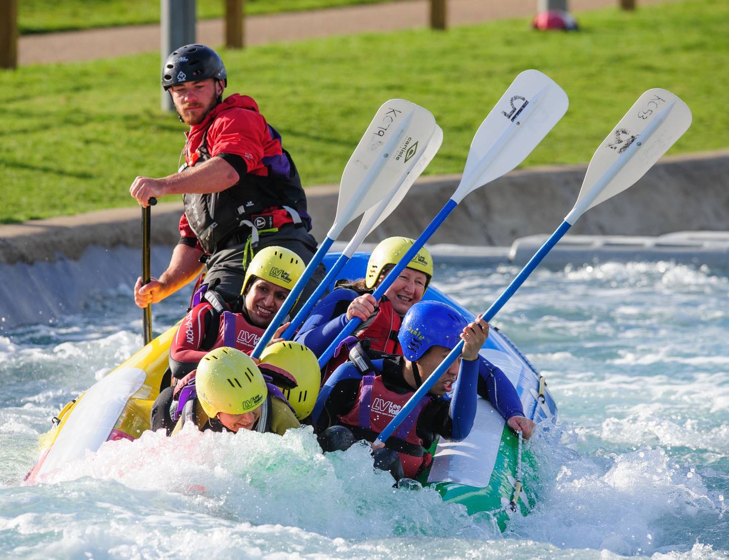 A group of people take part in a Metro Blind Sport water activity