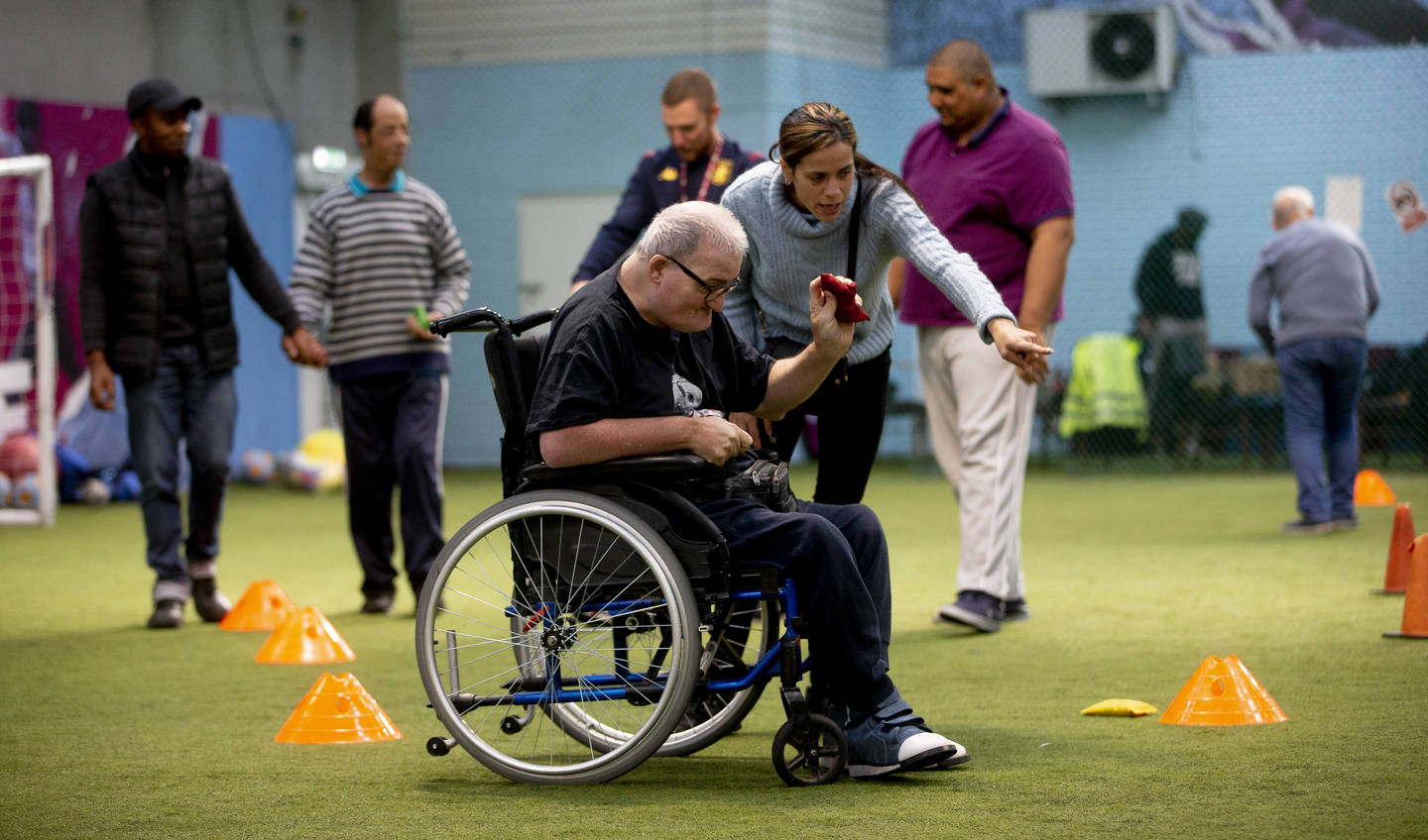 Disabled people taking part in bean bag games at Aston Villa inclusion session