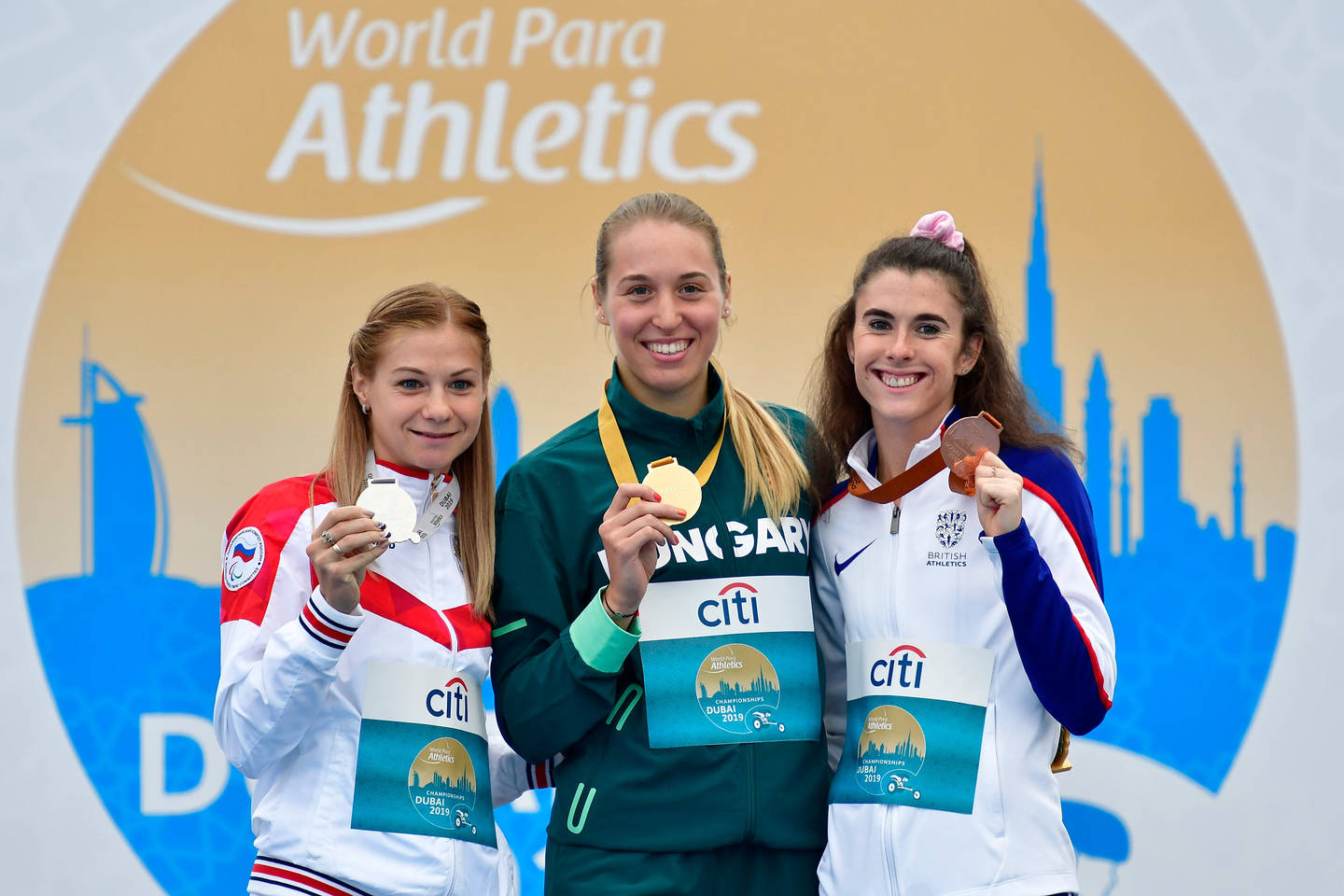 Olivia Breen on the podium after winning bronze the Worlds 2019