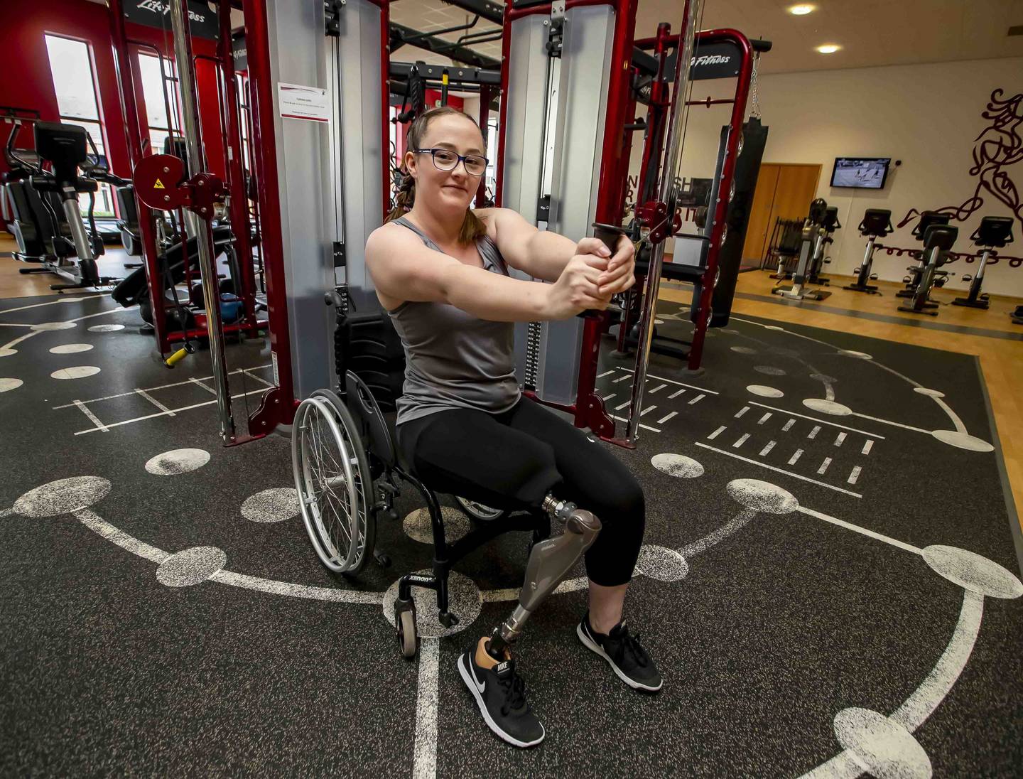 Jodie on weights machine at the gym