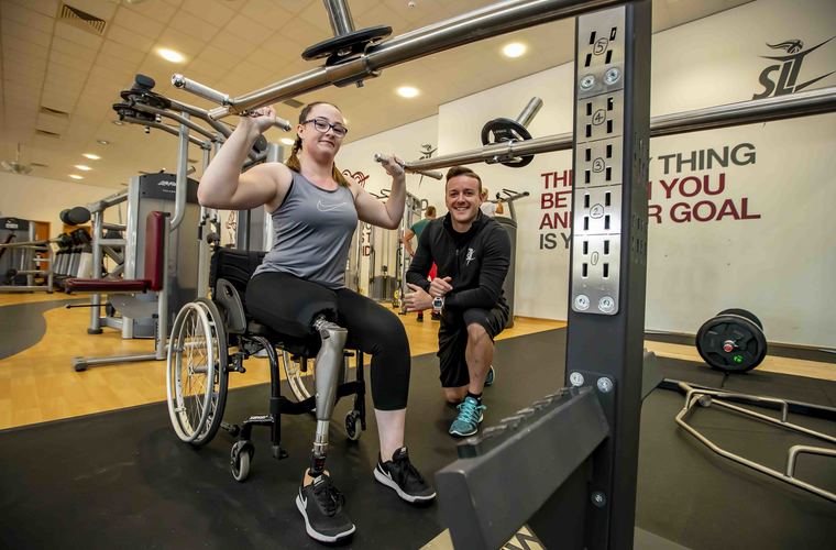 Image shows Scott training Jodie at the gym