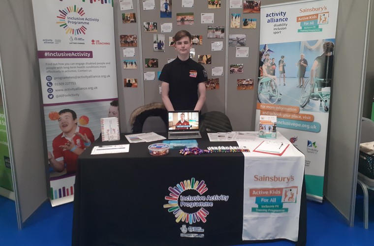 Josh working for Activity Alliance at Kidz in the Middle exhibition