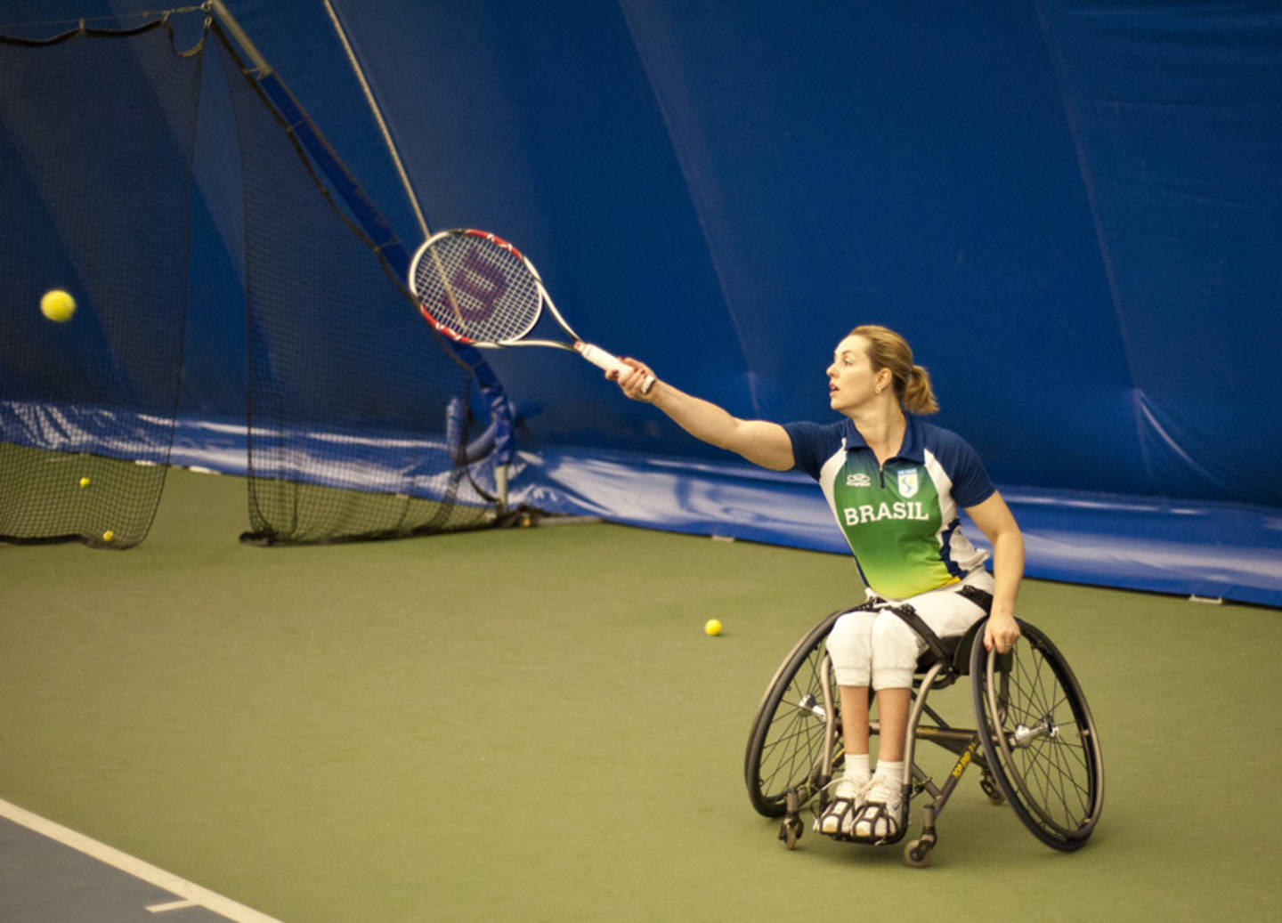 Sam Bullock playing tennis