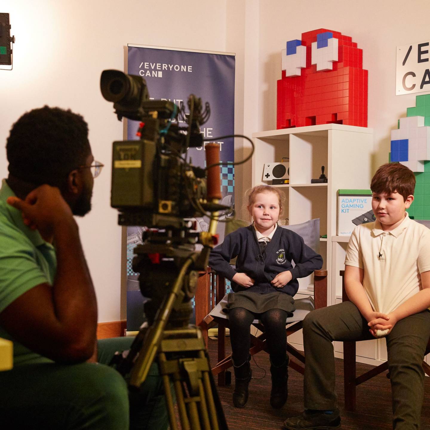 Camera operator interviewing children at an Activity Alliance shoot