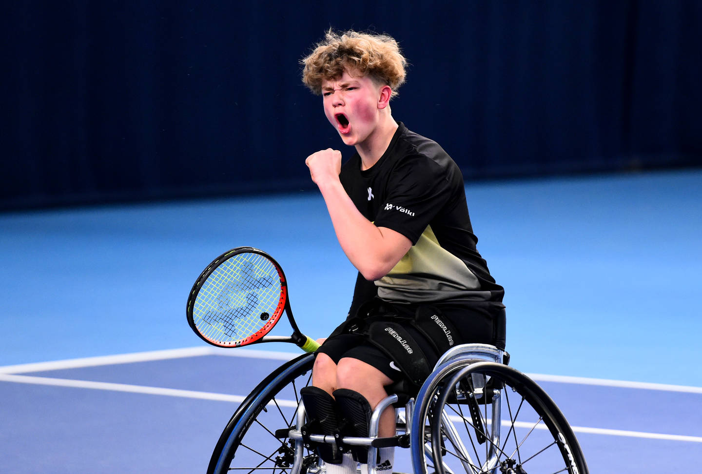 Ben Bartram on tennis court.