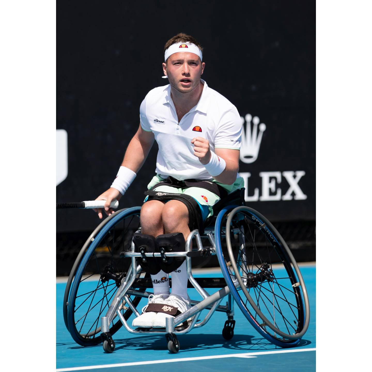 Alfie Hewett taking a shot in a game of tennis. Credit LTA