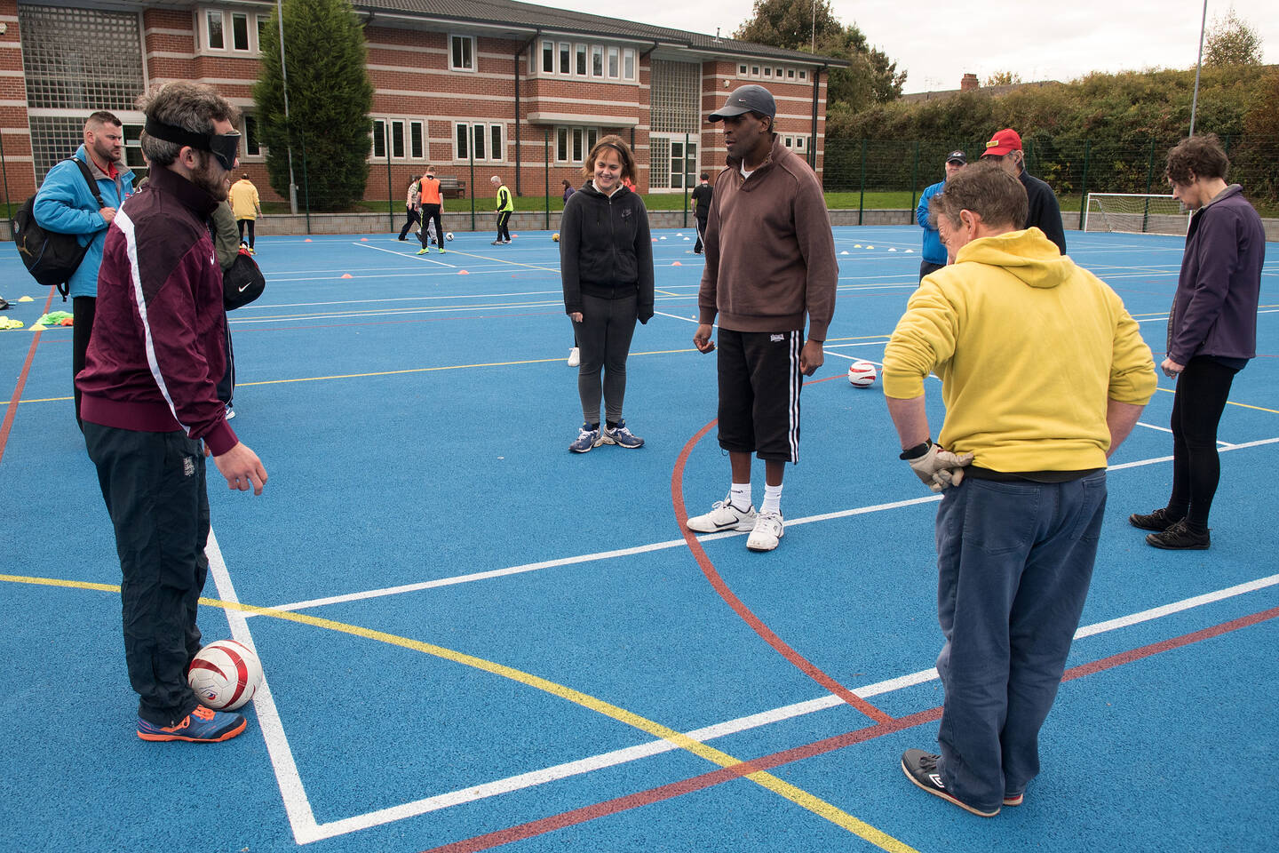 Players taking part in a British Blind Sport football session