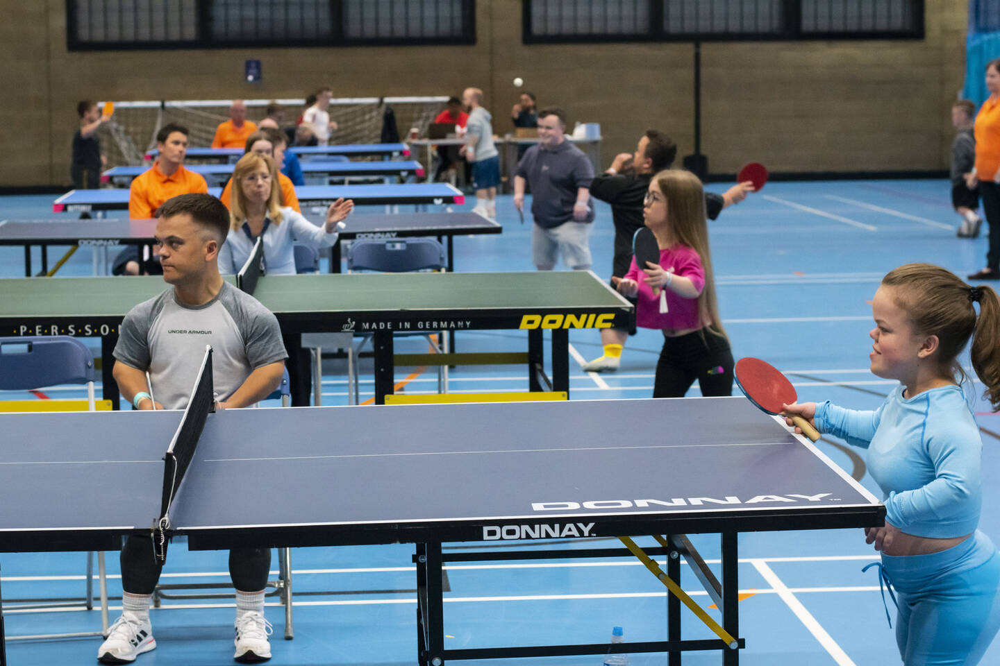 People playing table tennis at National Dwarf Games