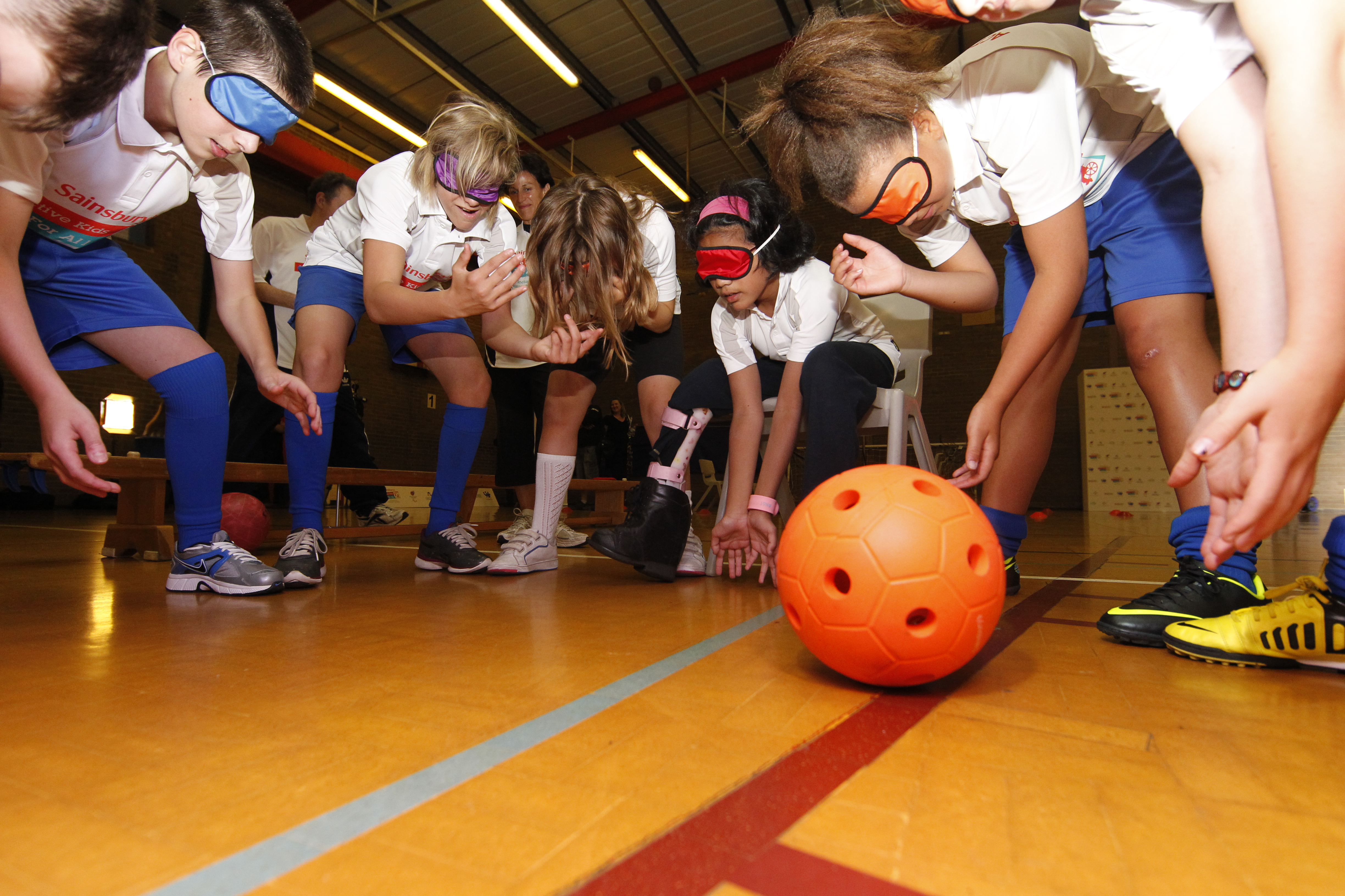 Children playing an adapted game