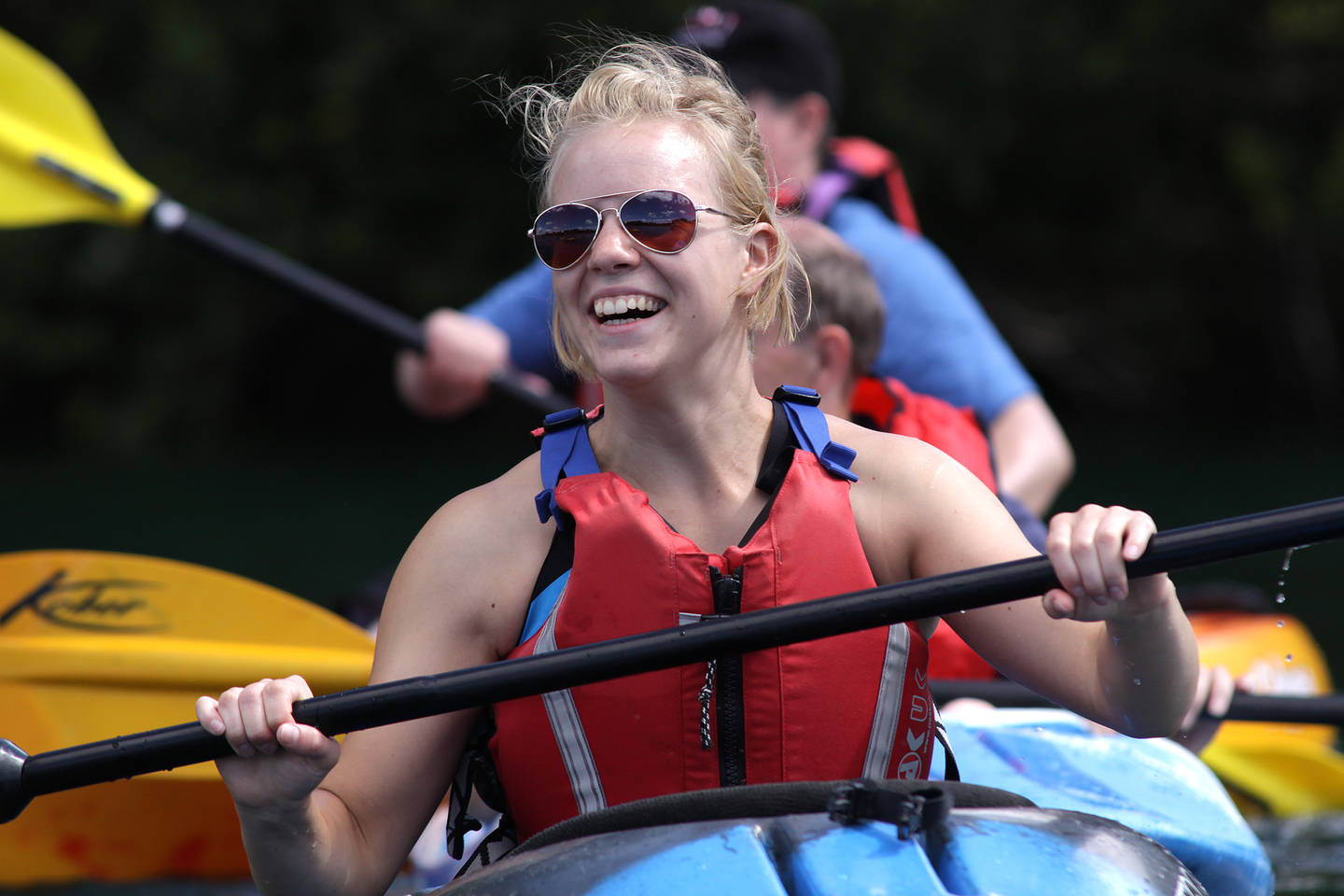 Woman happy in a canoe