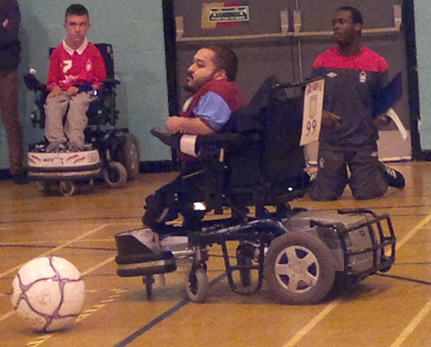 Amir Ali playing powerchair football